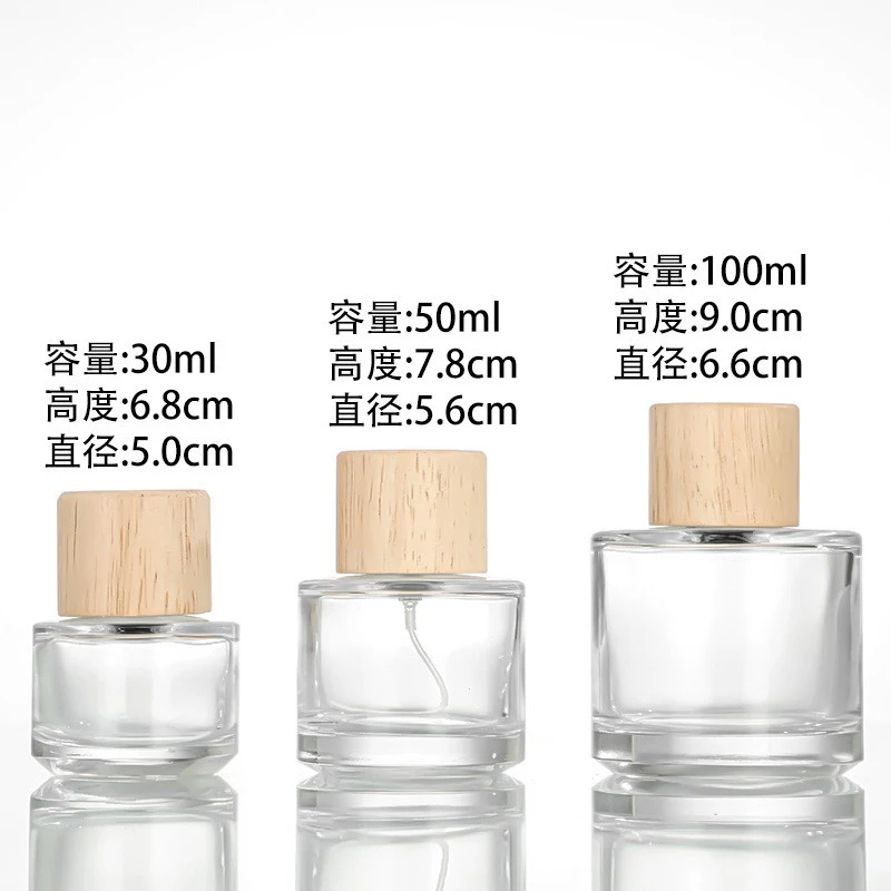 Sunshine Empty 30ml 50ml 100ml Thick Bottom Round Cylindrical Glass Bottle Perfume Round Perfume Bottle With Wooden Cap
